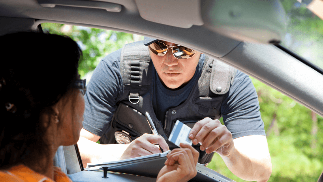 police officer giving a speeding ticket