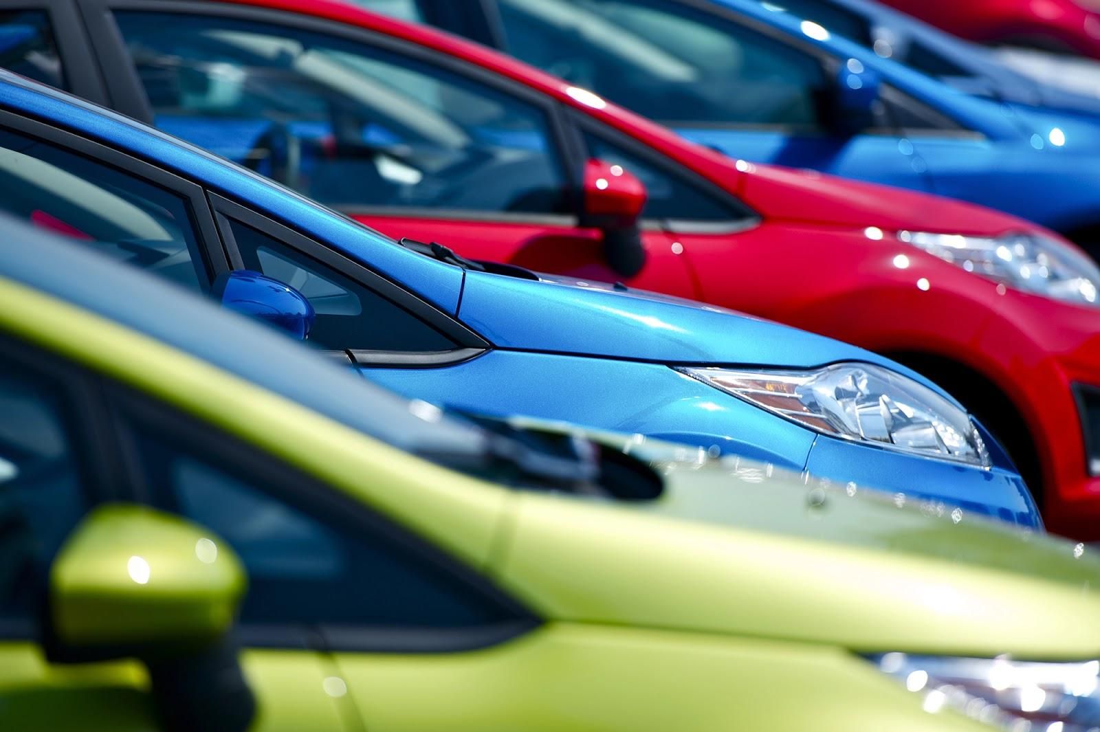 Colorful small cars parked in a row